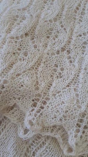 Delicate knit pattern of baby alpaca shawl